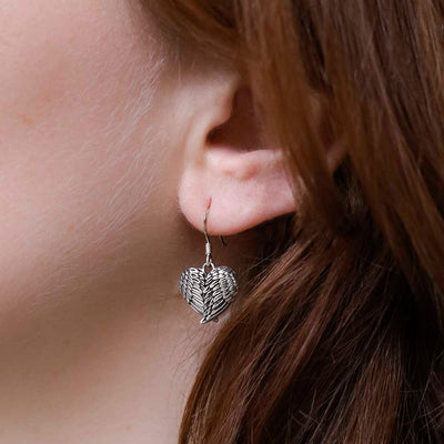 MC176_Sterling Silver Love Wings Dangly Earrings_Model