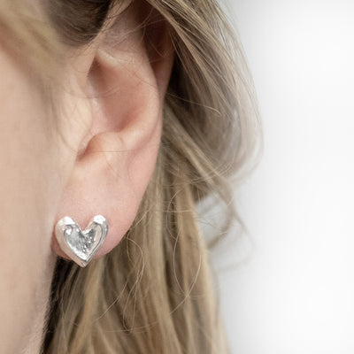 MK823 Sterling Silver Molten Heart Studs Model Shot