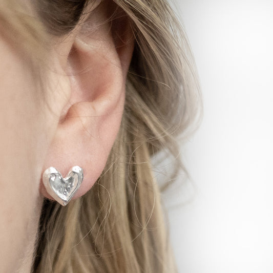 MK823 Sterling Silver Molten Heart Studs Model Shot