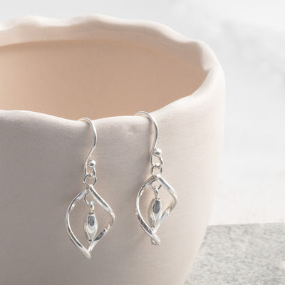 MK821 Sterling Silver Twirl Dangly Earrings 1