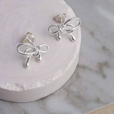 MK831 Sterling Silver Bow Studs 2