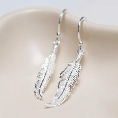 ME497_Sterling Silver Dangly Lucky Feather Earrings_1