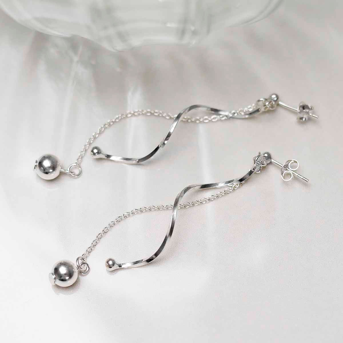 Sterling Silver Dancing Twist And Ball Stud Earrings