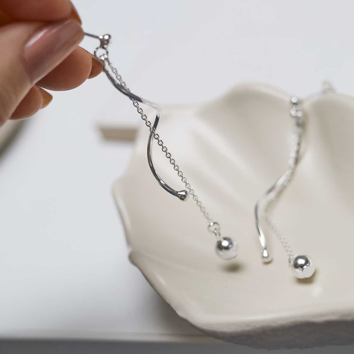 Sterling Silver Dancing Twist And Ball Stud Earrings