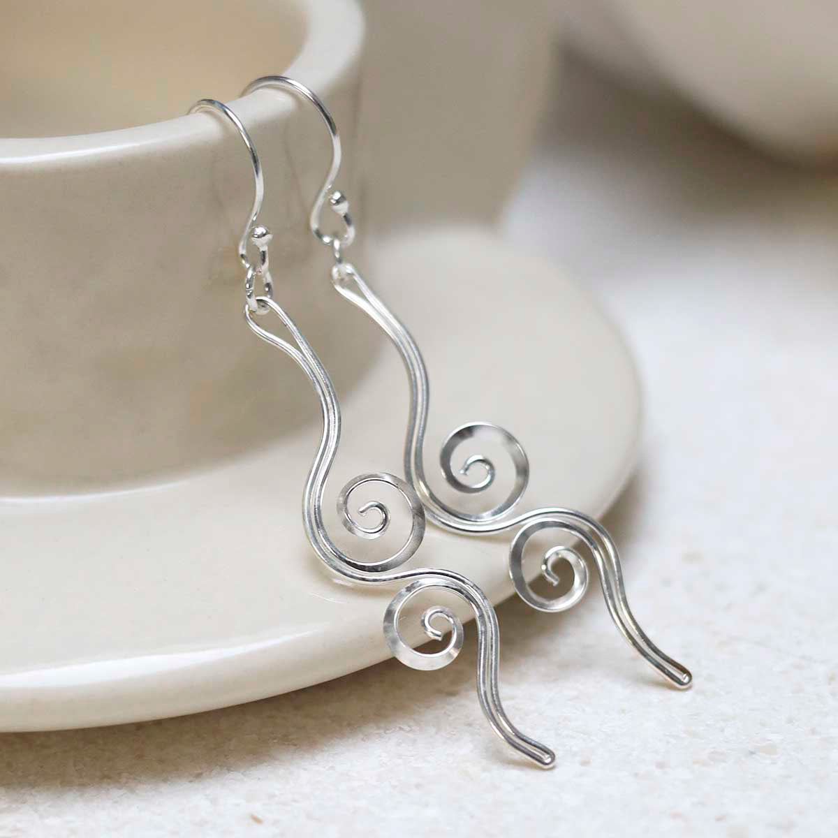 Sterling Silver Reflected Twirl Dangly Earrings