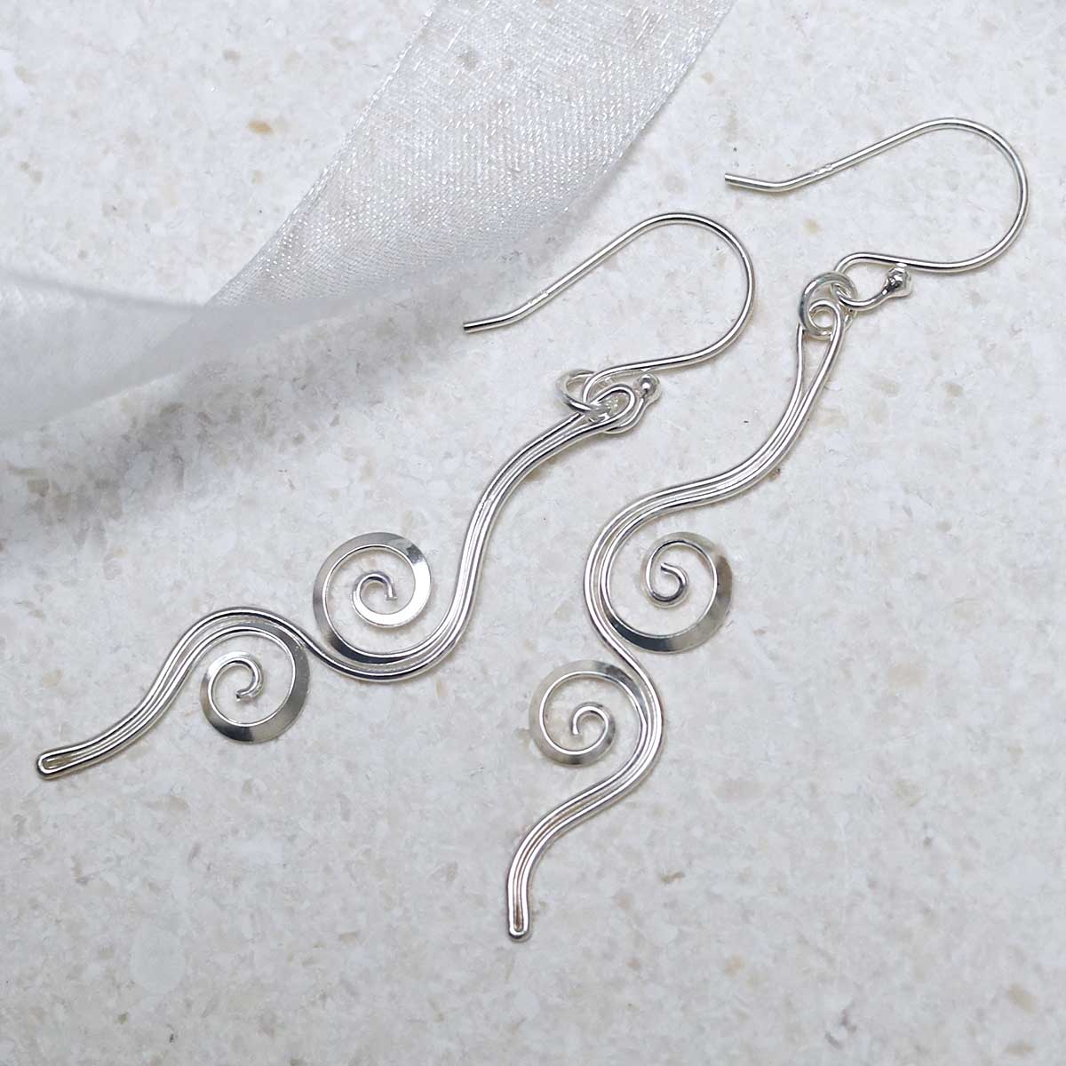 Sterling Silver Reflected Twirl Dangly Earrings