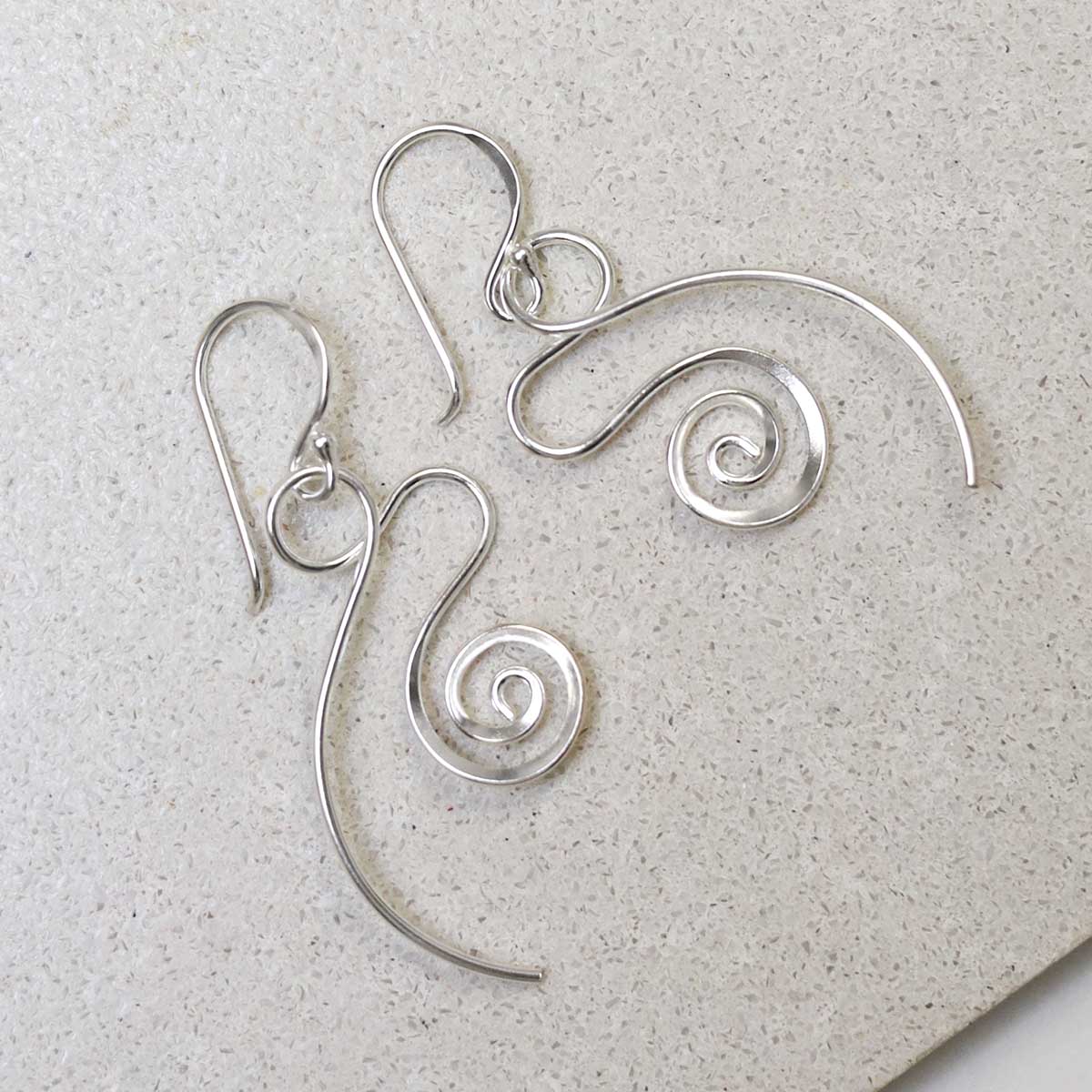 Sterling Silver Twirling Ribbon Dangly Earrings