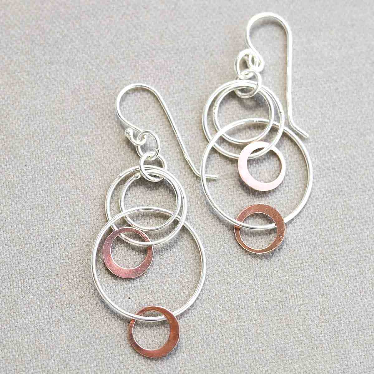 Sterling Silver and Rose Gold Swinging Circles Dangly Earrings