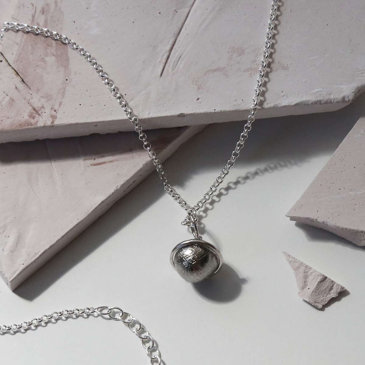 Meteorite And Silver Saturn Necklace
