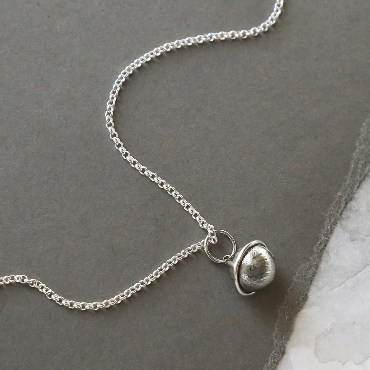 Meteorite And Silver Saturn Necklace