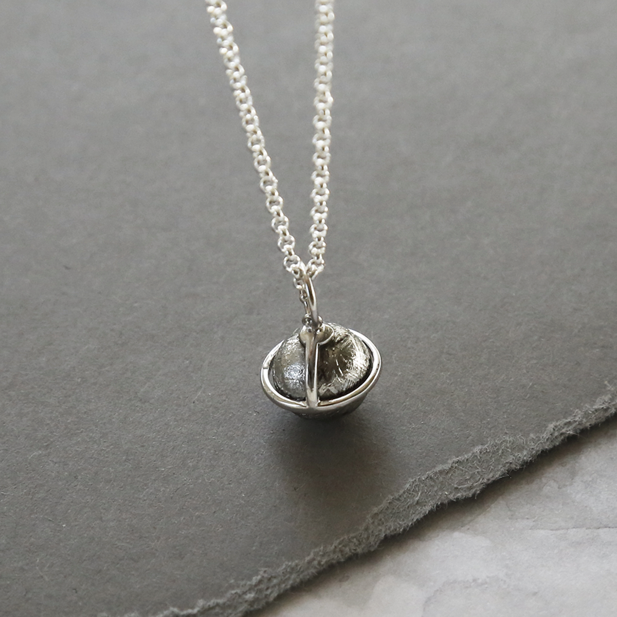 Meteorite And Silver Saturn Necklace