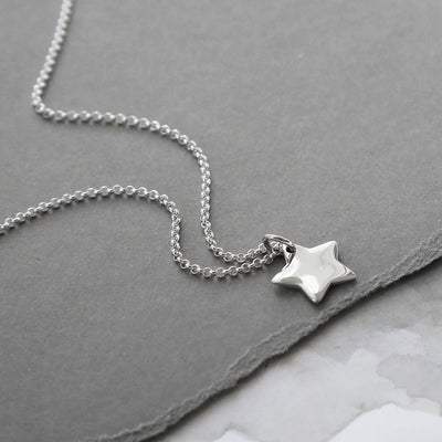 MC272 3 POLISHED STAR NECKLACE.png