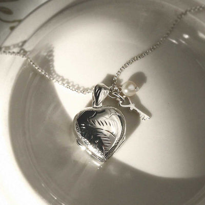 MC177 Sterling Silver Four Piece Heart Locket add ons 1110x11102 1