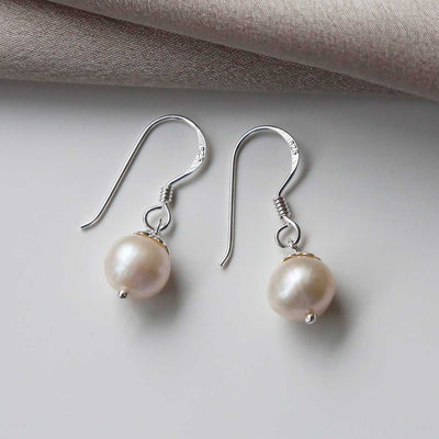 MK803E STERLING SILVER ROUND PEARL DANGLY EARRINGS 4 1110X1110