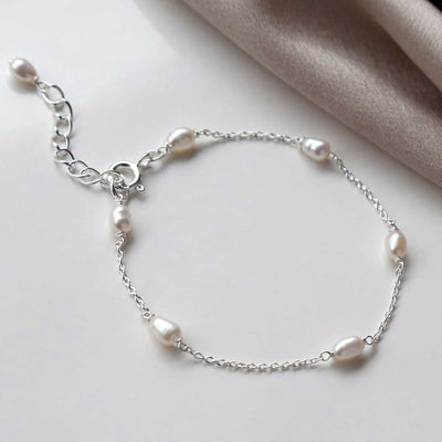 MK813 STERLING SILVER DEW DROP PEARL BRACELET SMALL 1110x1110 2