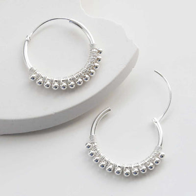 ML942 STERLING SILVER TWELVE BALL SETAIL HOOP 1110X1110