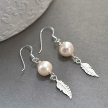 MK805 Sterling Silver Pearl And Feather Dangly Earrings