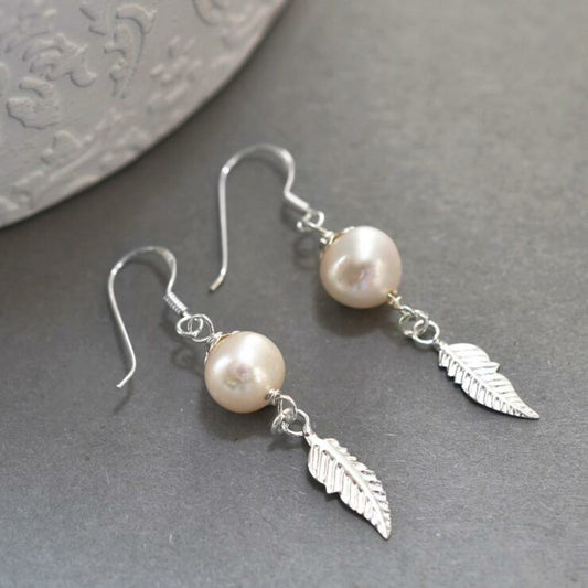 MK805 Sterling Silver Pearl And Feather Dangly Earrings