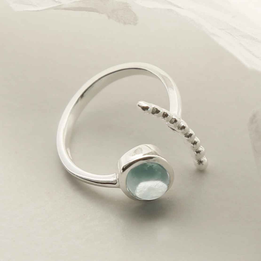 Sterling Silver Blue Topaz Adjustable Ring