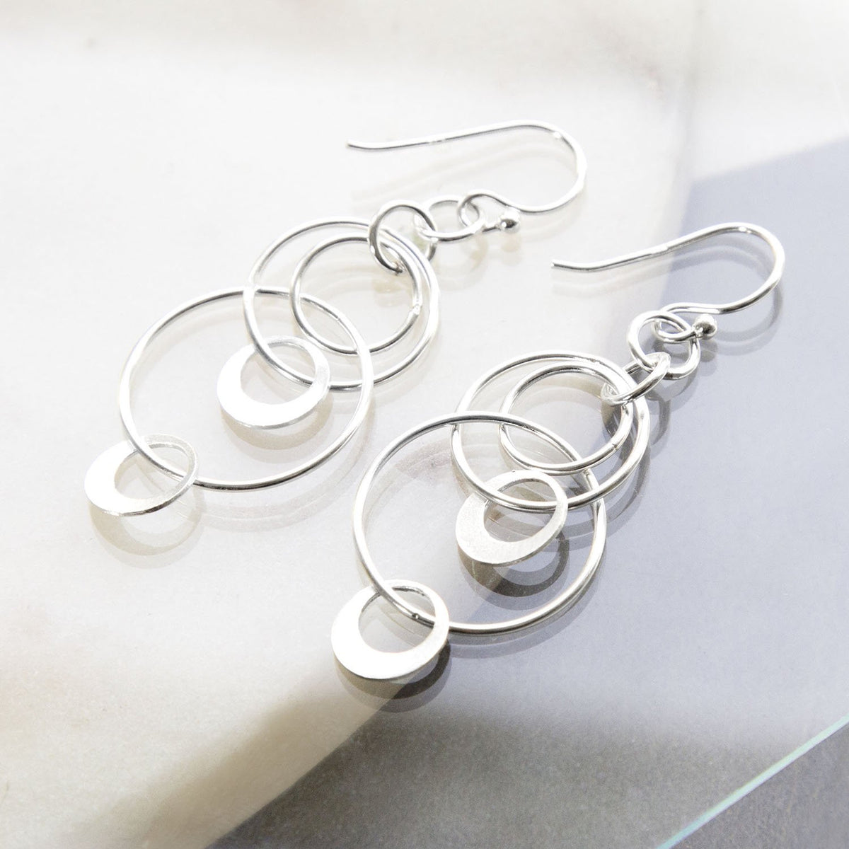 Sterling Silver Swinging Circles Dangly Earrings