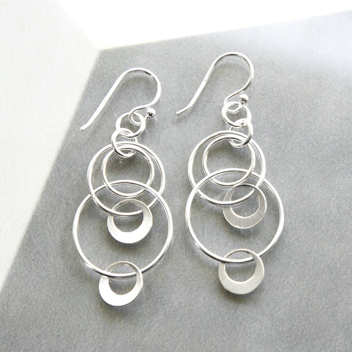 Sterling Silver Swinging Circles Dangly Earrings