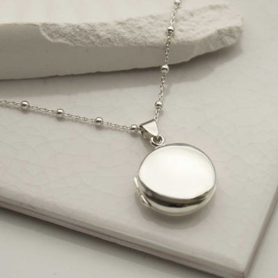 MC279 STERLING SILVER ROUND LOCKET 5
