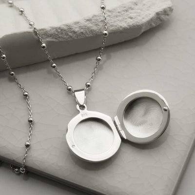 MC279 STERLING SILVER ROUND LOCKET 6