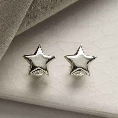 MC285 STERLING SILVER POLISHED STAR STUDS 1