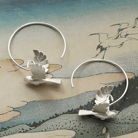 MB214 STERLING SILVER FLYING BIRD HOOPS 3