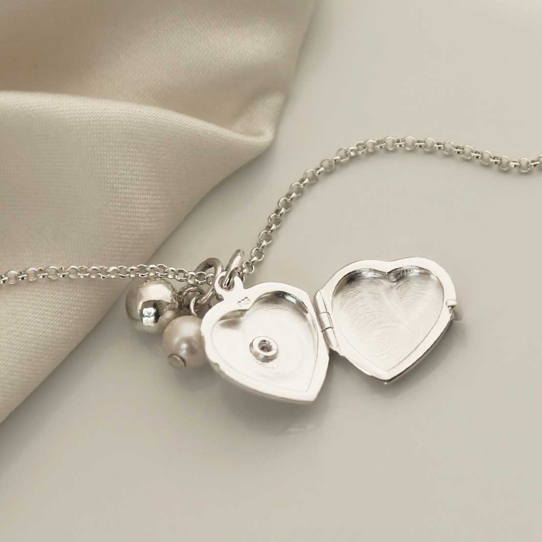 Sterling Silver Diamond Kissed Locket Necklace