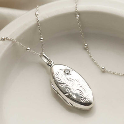 MC154 STERLING SILVER OVAL LOCKET NECKLACE ZIRCONIA 1