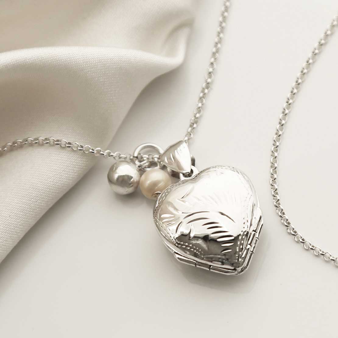 Sterling Silver Four Piece Heart Locket Necklace