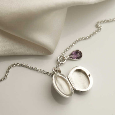 MC197 STERLING SILVER LITTLE OVAL LOCKET AMETHYST OPEN 1