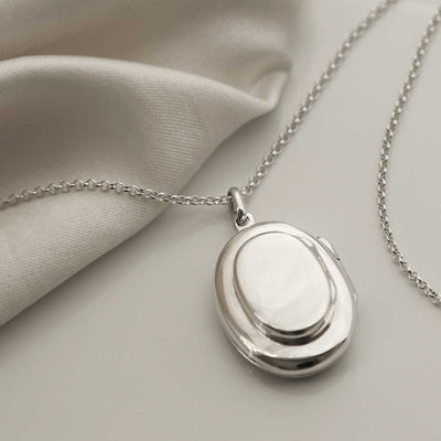 MC168 STERLING SILVER DOUBLE OVAL LOCKET NECKLACE 1