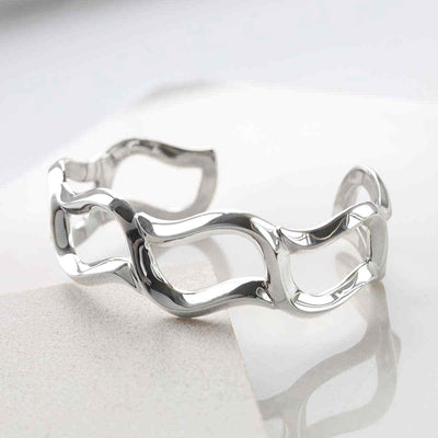 MP03 STERLING SILVER WARPED BANGLE 1
