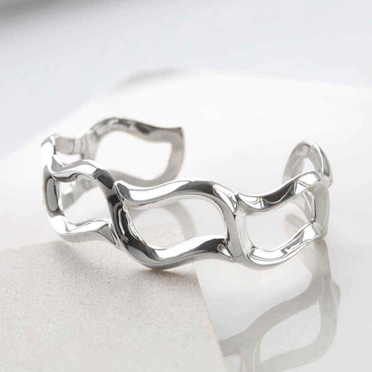 MP03 STERLING SILVER WARPED BANGLE 1