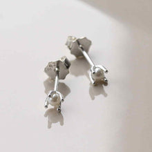 ML828 STERLING SILVER TINY PEARL STUD EARRINGS 1