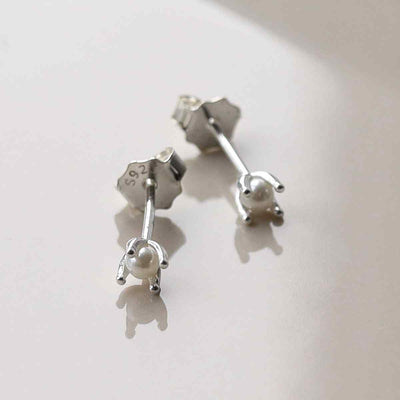 ML828 STERLING SILVER TINY PEARL STUD EARRINGS 1