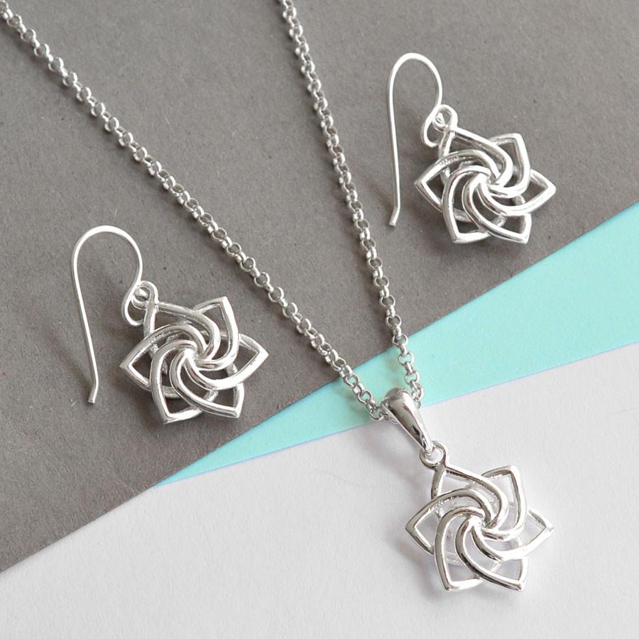 Sterling Silver Dangly Swirling Star Earrings