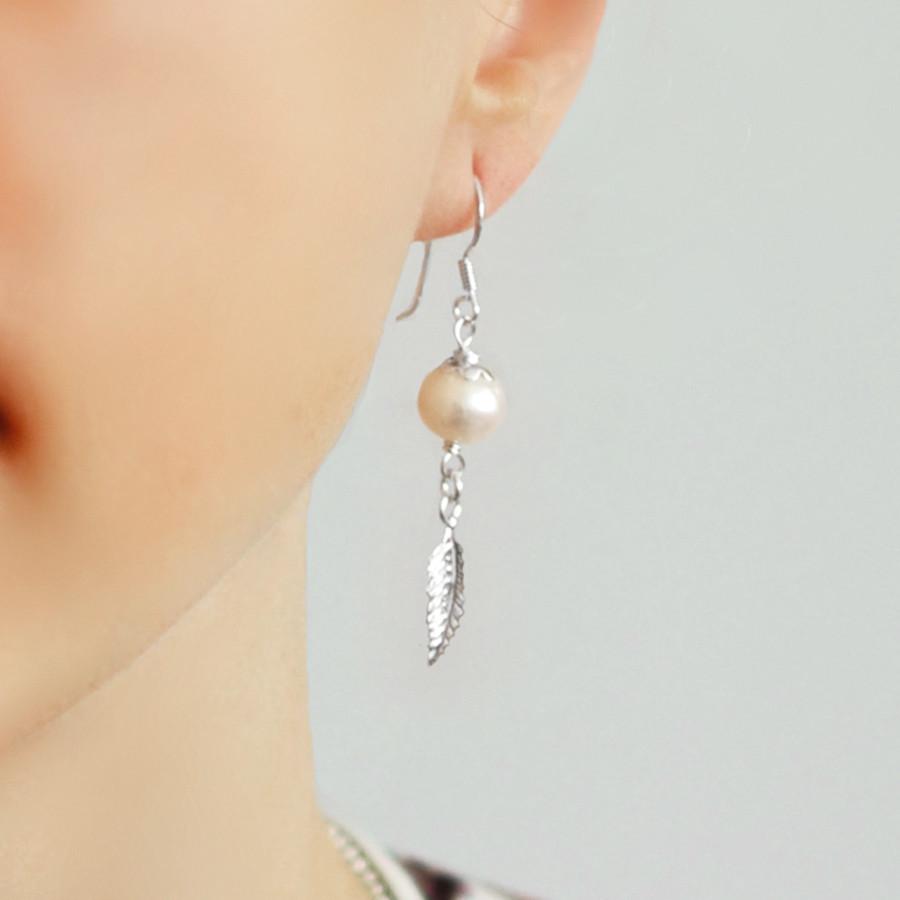 Sterling Silver Pearl And Feather Dangly Earrings