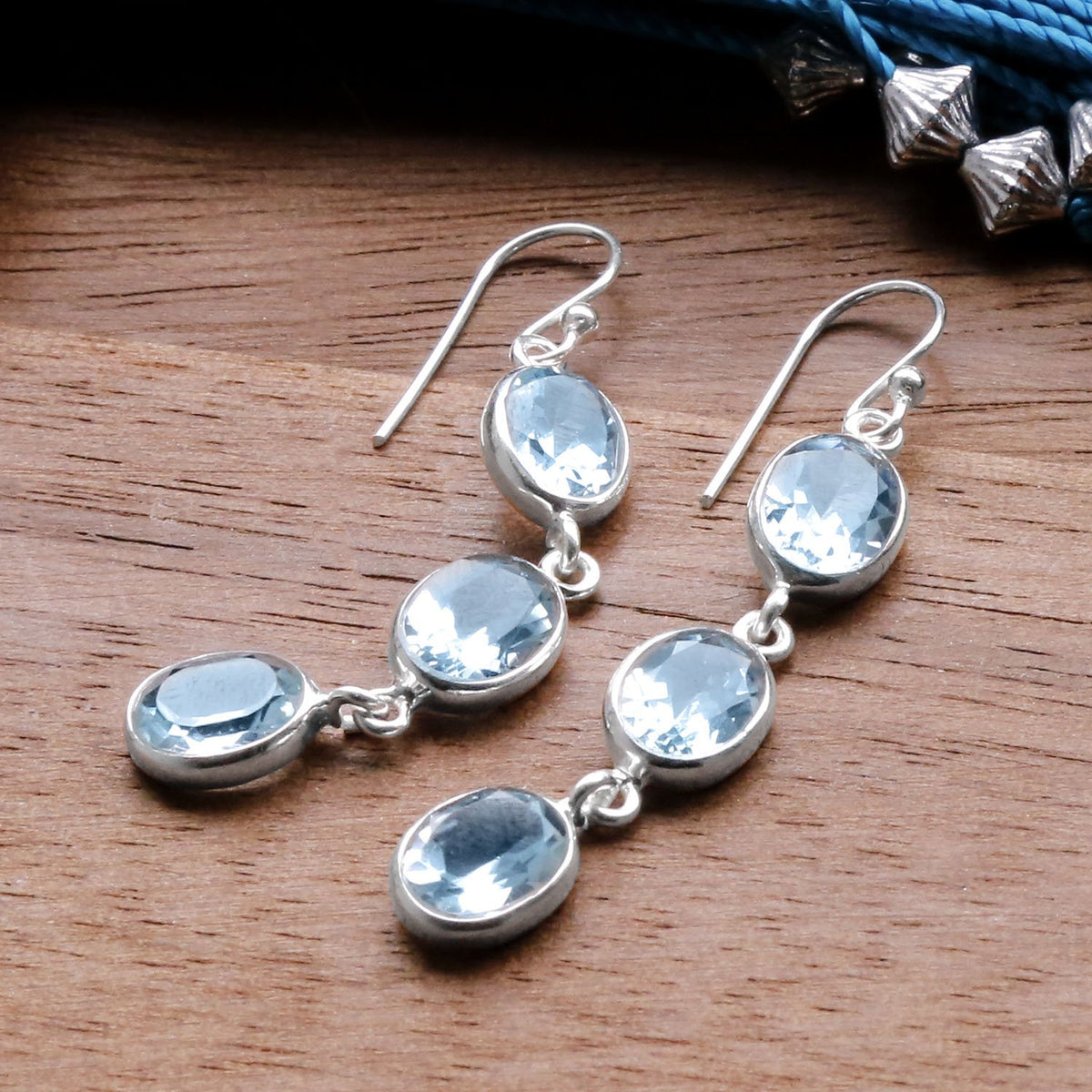 Sterling Silver Triple Blue Topaz Dangly Oval Earrings