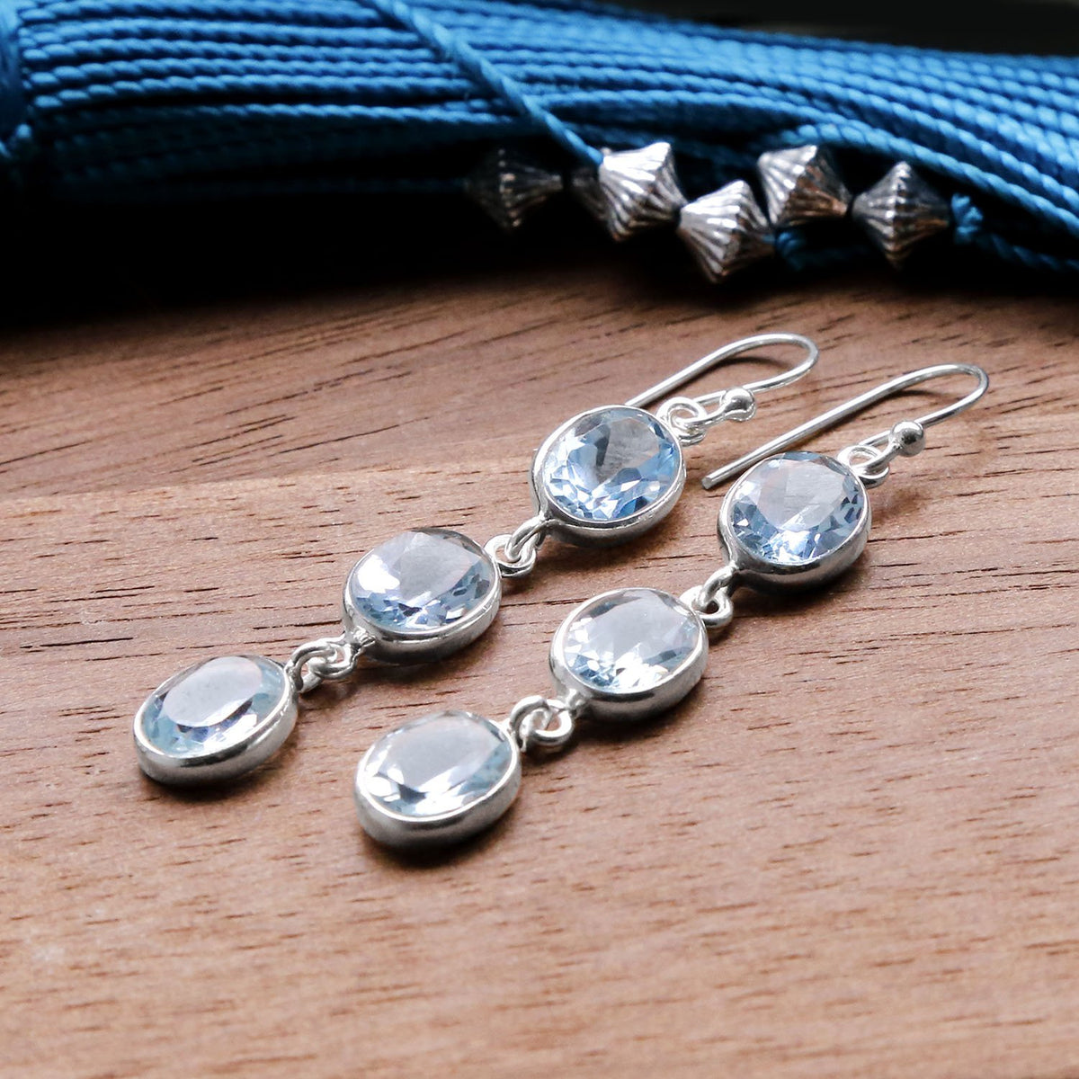 Sterling Silver Triple Blue Topaz Dangly Oval Earrings