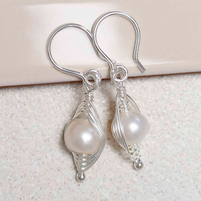 ML801 Sterling Silver Pearl Wire Dangly Earrings