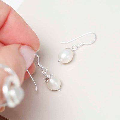 MK804S Sterling Silver Dew Drop Pearl Dangly Earrings 2