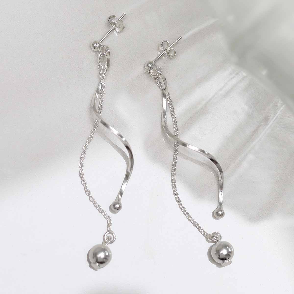 Sterling Silver Dancing Twist And Ball Stud Earrings