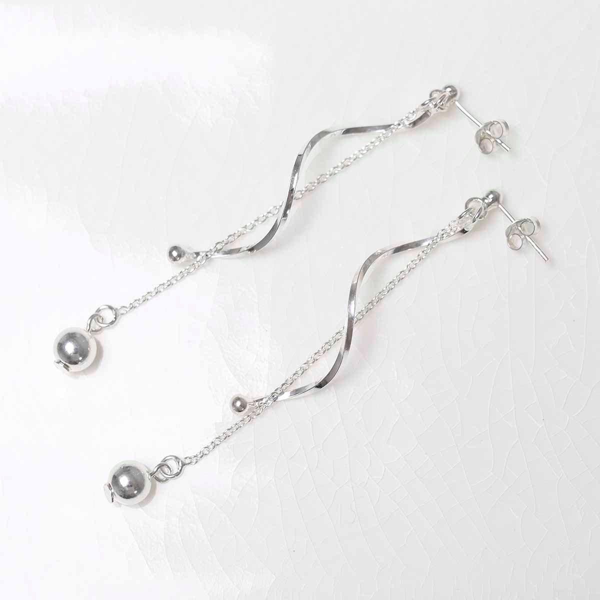 Sterling Silver Dancing Twist And Ball Stud Earrings