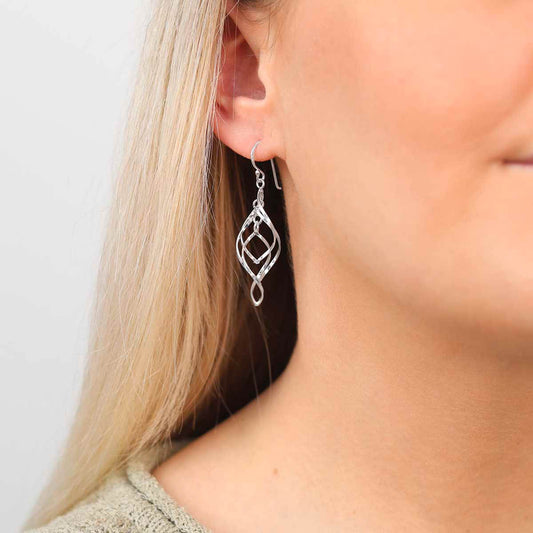 ME533 Sterling Silver Triple Twist Earrings Model