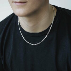 heavy sterling silver curb chain on male model wearing black tshirt