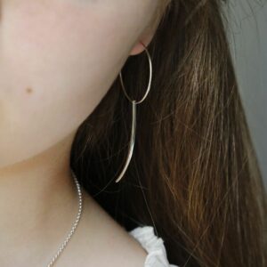 Sterling Silver Claw Earring With Claw on Model with brown hair