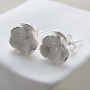 Silver open blossom stud earrings